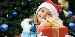 Merry,Christmas,-,Little,Girl,With,Christmas,Gift - 1